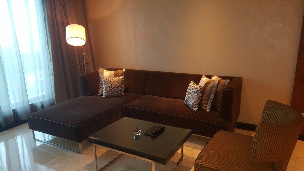 Vivanta Hyderabad, Begumpet Eksteriør bilde A living room in a suite at the Ritz-Carlton, Kuala Lumpur